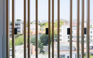 a view of a city through a window at Residence Cala Vela Tower in Riccione