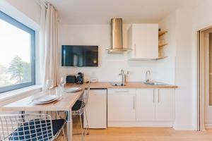 Kuchyň nebo kuchyňský kout v ubytování Renovated studio apartment in Marcq-en-Barœul