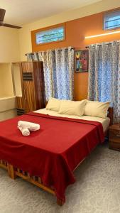 Ένα ή περισσότερα κρεβάτια σε δωμάτιο στο Moonlight Residency