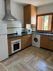 Køkken eller tekøkken på Apartamento planta baja con jardín privado