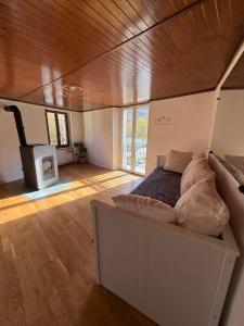 Ένα ή περισσότερα κρεβάτια σε δωμάτιο στο Face au chateau