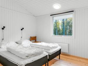 Postel nebo postele na pokoji v ubytování Holiday Home Alika - 300m from the sea by Interhome