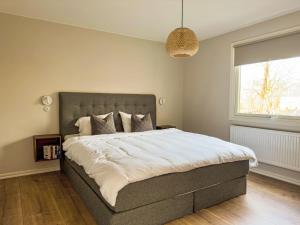 Ένα ή περισσότερα κρεβάτια σε δωμάτιο στο Holiday Home Ramnås by Interhome