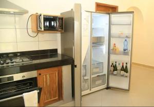 Kuchyň nebo kuchyňský kout v ubytování Villa Marina