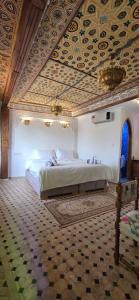 Postel nebo postele na pokoji v ubytování Riad Zellige Rahba
