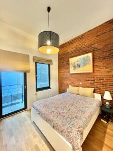 Una cama o camas en una habitación de Hyper centre appartement brussels