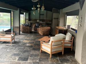 Posezení v ubytování BEE Boutique Lodge