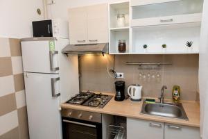 Køkken eller tekøkken på FLH - The French Cottage