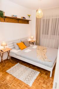 En eller flere senge i et værelse på FLH - The French Cottage