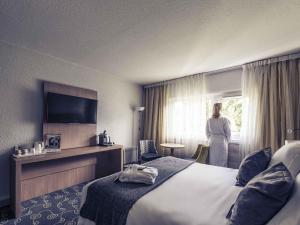 Postel nebo postele na pokoji v ubytování Mercure Annecy Sud + 58 fotografií