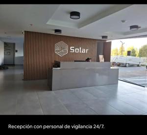 a lobby with a reception desk in a building at Apartamento Suite Chía Solar 228 in Chía