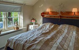 Postel nebo postele na pokoji v ubytování Cozy Home In Ermelo With Wifi