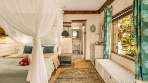 Postel nebo postele na pokoji v ubytování La Cabane du Pecheur