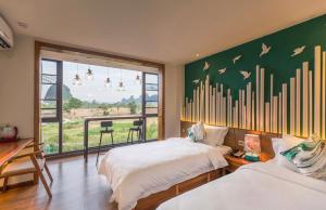 Postel nebo postele na pokoji v ubytování Cozy Mountain Retreat