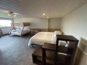 Postel nebo postele na pokoji v ubytování Exceptionnel Loft