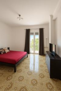 Ένα ή περισσότερα κρεβάτια σε δωμάτιο στο Appartement moderne et lumineux à Rome Italie