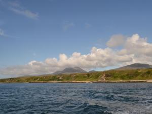 a view of a body of water with mountains in the background at Tigh Na Maraiche in Isle of Jura +12 photos