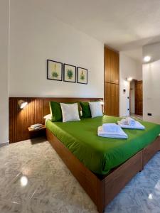 Postel nebo postele na pokoji v ubytování Corte 'e Susu - Domo Experience