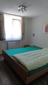 Postel nebo postele na pokoji v ubytování Haus Holiday