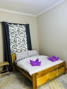 Ένα ή περισσότερα κρεβάτια σε δωμάτιο στο The Black mamba