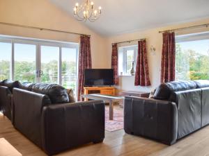 Et opholdsområde på Holly Tree Barn - Uk49607