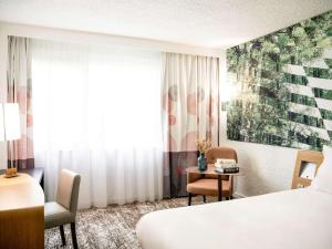 Postel nebo postele na pokoji v ubytování Novotel Bordeaux Mérignac + 227 fotografií