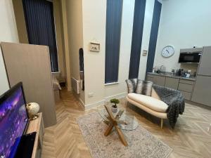 Kuchyň nebo kuchyňský kout v ubytování City Chic Apartment in Leeds