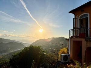 a view of the sunset from a house at Ca du Len Gorra - MTB's Friendly in Finale Ligure