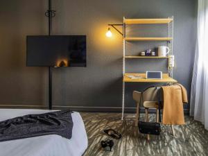 TV a/nebo společenská místnost v ubytování Novotel Metz Amnéville