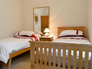 Giường trong phòng chung tại Skiddaw +3 ảnh