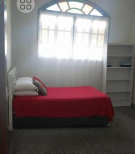 Ένα ή περισσότερα κρεβάτια σε δωμάτιο στο Ap de frente a praia das Tartarugas