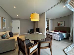 Χώρος καθιστικού στο Apartamento Executivo próximo a praia