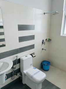 Ένα μπάνιο στο Cara home stay