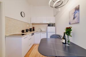 Η κουζίνα ή μικρή κουζίνα στο Apartment Luxury