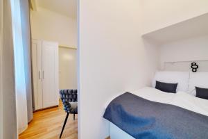 Ένα ή περισσότερα κρεβάτια σε δωμάτιο στο Apartment Luxury