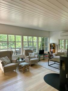 Posezení v ubytování Badehotels Inspireret Sommerhus På Møn