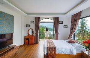 Postel nebo postele na pokoji v ubytování Hillside Villa Sapa