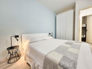 Postel nebo postele na pokoji v ubytování Garda Breeze By Case al Lago