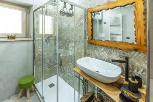 a bathroom with a sink and a shower at Casicarillo 800 in Serino