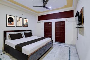 Ένα ή περισσότερα κρεβάτια σε δωμάτιο στο Hotel O Moon Light