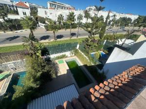 an aerial view of a house with a swimming pool at Dar Salma in Tangier