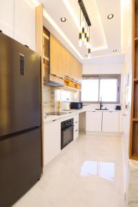 Cuina o zona de cuina de Le Nour 2 modern bedrooms - Luxury and Comfort