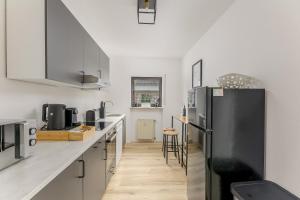 Kuchyň nebo kuchyňský kout v ubytování Amaela Design-Wohnung, SAP, Parkplatz, Balkon, NEU