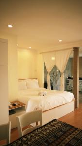 Ένα ή περισσότερα κρεβάτια σε δωμάτιο στο Hanoi Brilliant Home