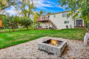 a fire pit in the backyard of a house at Spacious 3 Bedroom in Cary