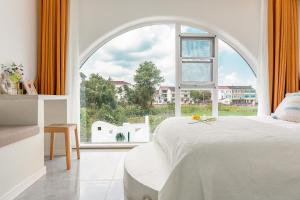 Postel nebo postele na pokoji v ubytování 上海半窗酒店-上海迪士尼店 + 68 fotografií