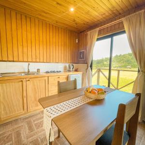 Η κουζίνα ή μικρή κουζίνα στο Cabañas Rimü - Cabaña para 2 personas
