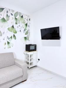 TV a/nebo společenská místnost v ubytování Civico27