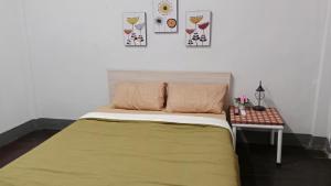 Ένα ή περισσότερα κρεβάτια σε δωμάτιο στο PK101 Room