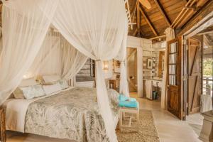 Ένα ή περισσότερα κρεβάτια σε δωμάτιο στο Harmonie +68 φωτογραφίες